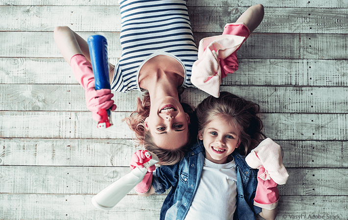 Woman and daughter with cleaning supplies | Do you hate cleaning? There are ways to have fun while cleaning your house! Check out these 13 easy tips and ideas for how to make cleaning fun. Great for kids, families, and teens, too!