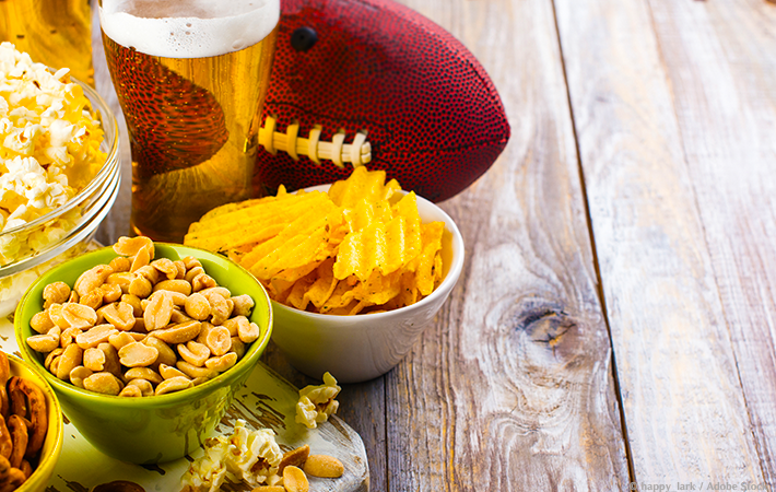 Does the thought of hosting a Super Bowl party overwhelm you? Learn how to host a stress-free Super Bowl party! Includes a quick and easy checklist, plus ideas for party favors, games, and snacks. #superbowl #party #stressless