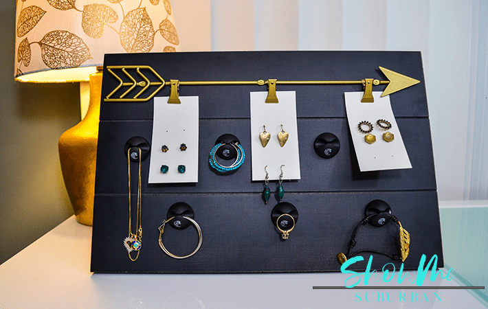 Cable clip organizers holding jewelry | Cable clip organizers can do more than hold your phone cord in place! This honest review of Blue Key World's cable clip organizers includes simple and unique DIY projects for a toothbrush holder, jewelry organizer, and custom dry erase board! #organized #organizing